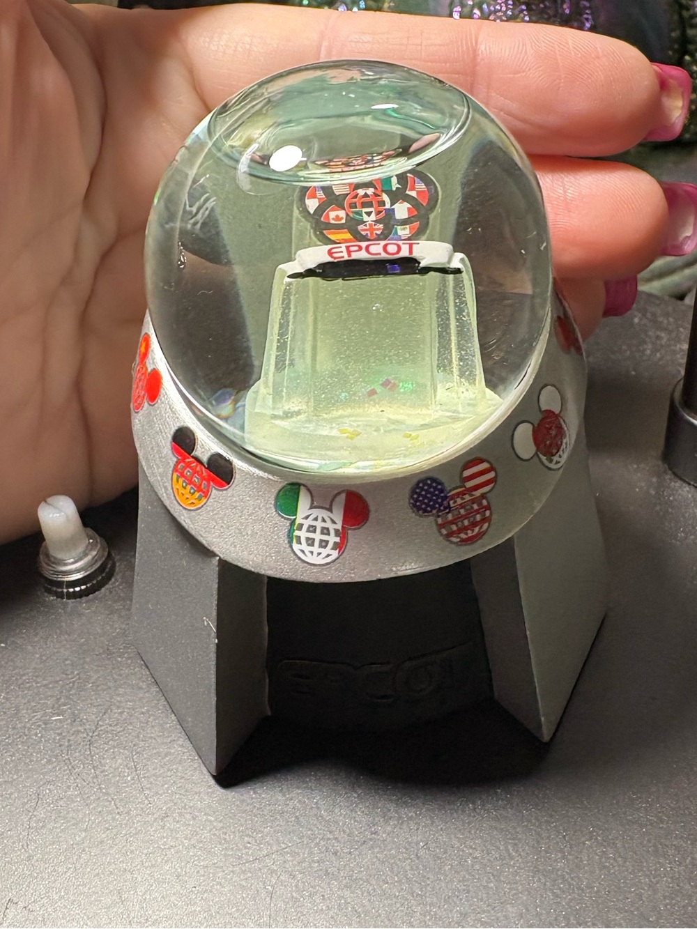 Disney Epcot miniature glass snow globe. Please look at the pictures good shape.